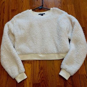 Faux white cropped sweatshirt.